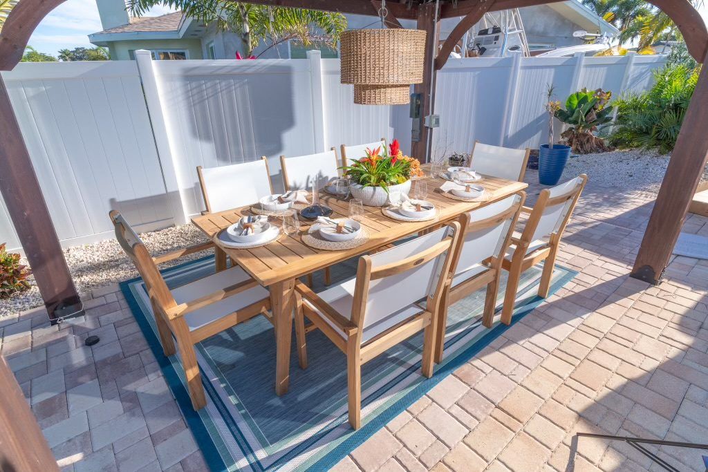 The Captiva Sling Stacking Chair-Gray, at home